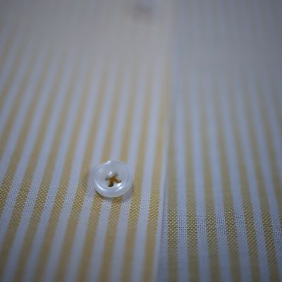 Sơ Mi TRAVALI cổ speard kẻ sọc vàng cam.